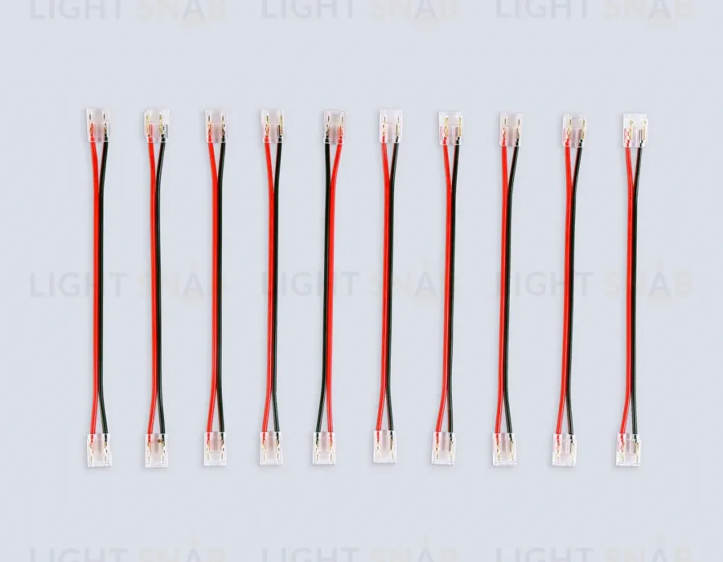 Соединитель гибкий двухсторонний Ambrella Light IlluminationCOB 12/24V для лент 8/10mm (2 конт.) (10шт. в комплекте) GS7895 GS7895