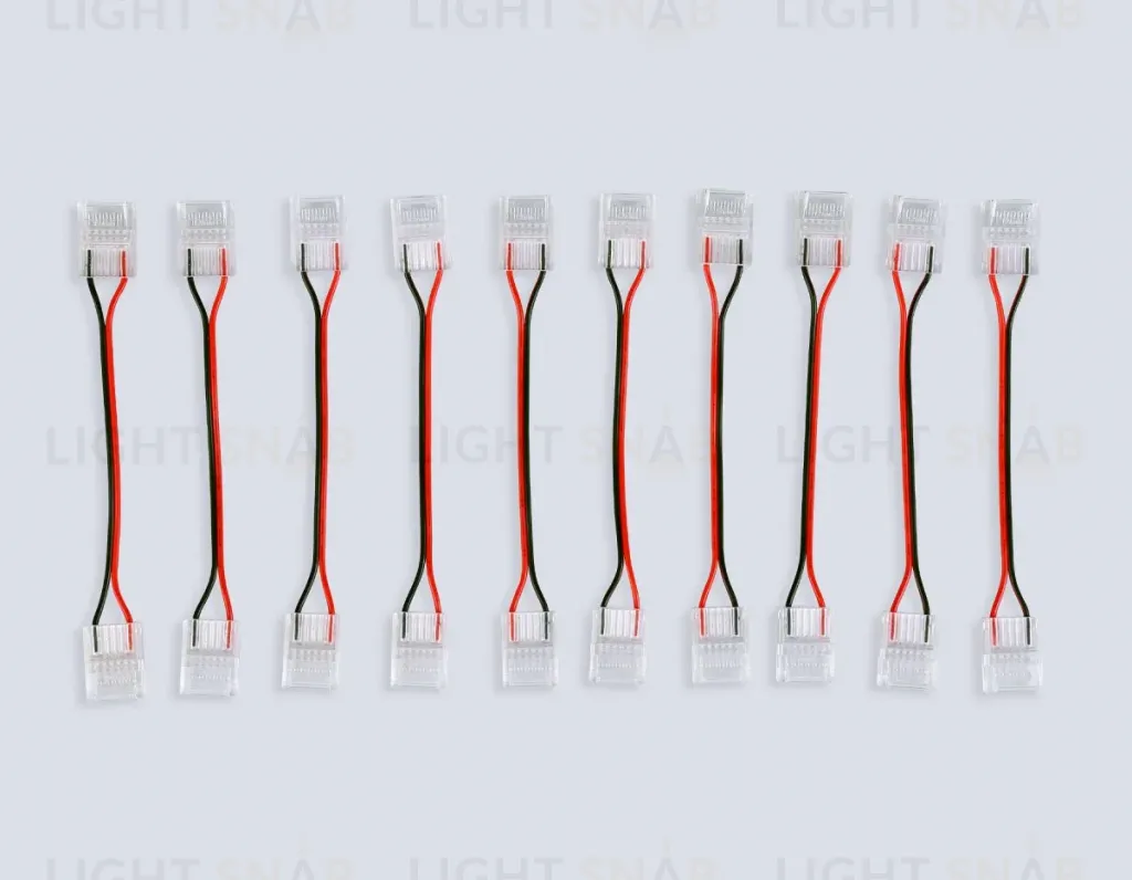 Соединитель гибкий двухсторонний Ambrella Light Illumination COB 12/24V для лент 12mm (2 конт.) (10шт. в комплекте) GS7898 GS7898